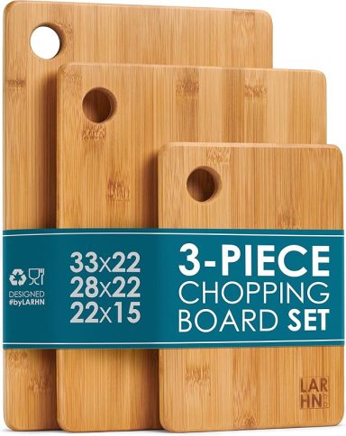 Three bamboo chopping boards in different sizes, with a blue label indicating "3-piece set."