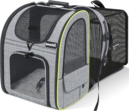Grey pet carrier with mesh sides and a front opening, featuring a shoulder strap.