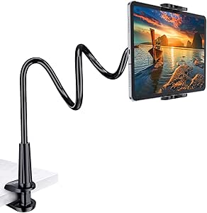 Flexible holder for a tablet, with a clamp and adjustable arm, displaying a sunset scene.