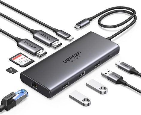 A multi-port USB-C hub with cables, card reader, and USB drives.