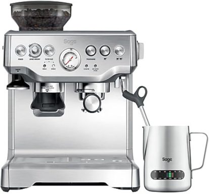 Silver espresso machine with a steam wand and stainless steel milk jug.