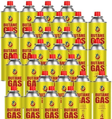 Multiple cans of butane gas arranged in a grid pattern.