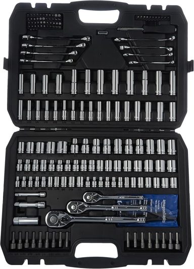 A comprehensive mechanic's tool set in a black case with various sockets and ratchets.