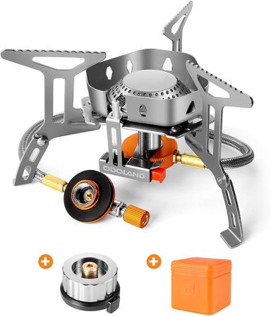Portable gas stove with adjustable legs, burner, and fuel connection accessories.