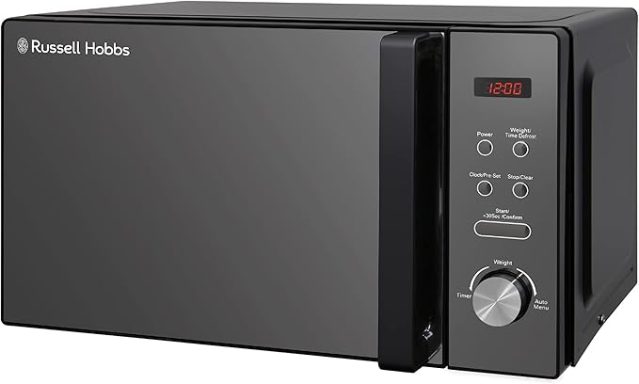 Black microwave oven with digital display and control knobs.