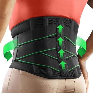 Black lumbar support brace with green adjustment straps on a model's waist.