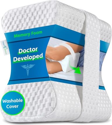 Memory foam leg support cushion with a washable cover, designed by a doctor.